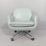 A 1980s Sunar Hauserman leather armchair on stylish chrome swivel base with casters, with maker's