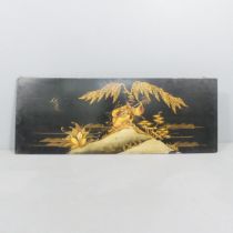 An Oriental lacquered panel with gilded decoration. 102x38cm.