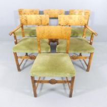 A set of six 1920s Swedish Grace Art Deco dining chairs in flame birch with Neoclassical carved