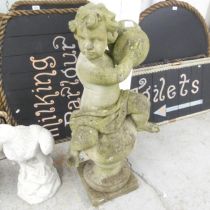 A weathered concrete garden statue, study of a cherub. Height 100cm.