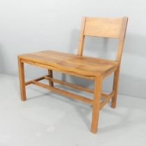 A contemporary design Tomoko bench by Sean Dix in American walnut. 80x80x44cm.