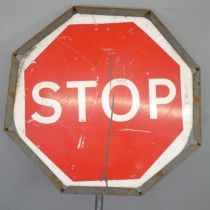 A metal framed Stop/Go road sign, Diameter 64cm, Height overall 210cm