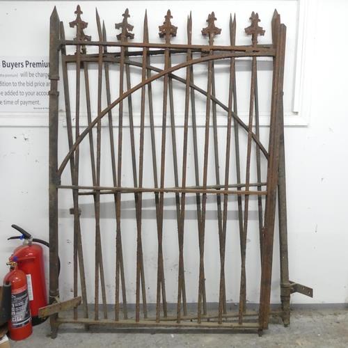 A pair of wrought iron gates with fleur-de-lis finials. Each (including hinge) 128x168cm. Good