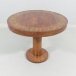 An Art Deco design coffee table with inlaid brass Indus Valley script decoration. 56x45cm.