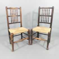 A matched pair of North Country elm and rush-seated spindle back side chairs.