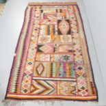 A Turkish Kilim carpet. 288x160cm. One area of damage, some signs of repair and small areas of