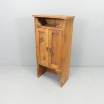 A modern stained pine two-door hall cabinet. 45x90x25cm.