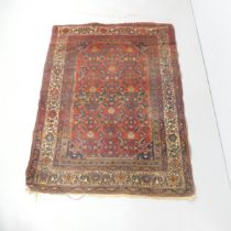 A red-ground Hamadan rug. 190x140cm.