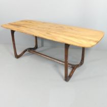 A mid-century Ercol dining table, model no. 513, the elm top on sculptural base. 198x73x81cm.