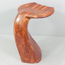 A 1980s whale tail flukes bartool of sculpted laminated block construction, in the manner of