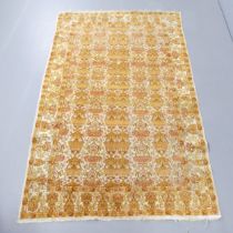 A yellow-ground Ushak rug. 190x122cm.