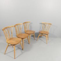 ERCOL - A set of four Shallstone candlestick dining chairs.