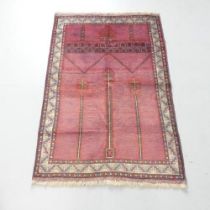 A red-ground Baluchi rug. 135x90cm