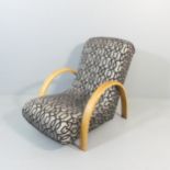 An original 1930s Art Deco Heals Banana lounge chair with bentwood arms in oak with later