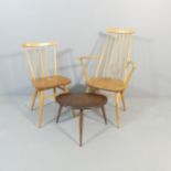 ERCOL - A model 391 dining chair, a Goldsmith carver chair and a pebble occasional table (3).