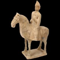 A Chinese Tang style terracotta horse and rider, height 31cm