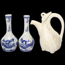 A Chinese white glaze pottery flagon and cover, height 16cm, and 2 small blue and white transfer