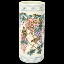 A Chinese porcelain cylinder vase, transfer printed birds and blossom and text, height 12cm