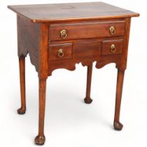 A George III fruitwood lowboy, with single frieze drawer and 2 short dummy drawers below, turned