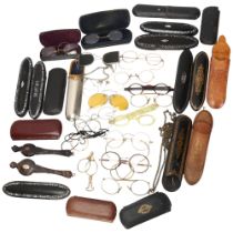 A large collection of mainly 19th century spectacles, monocles, lorgnettes and spectacle cases