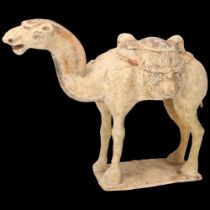 A Chinese Tang style terracotta camel, height 29cm