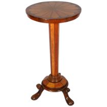 A Regency circular wine table, inlaid rosewood and satinwood with hexagonal centre column and carved
