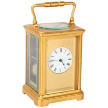 French gilt-brass carriage clock, enamel circular dial in gilded surround, 8-day movement striking