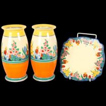 Pair of Clarice Cliff, Chloris pattern vases, shape no. 264, height 20cm, and a Chloris pattern cake