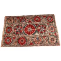 An Uzbek crewel embroidered panel, 160cm x 98cm Good condition, no tears or holes, backing