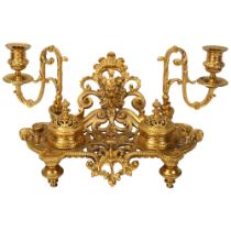 A gilt-bronze Rococo style desk stand, late 19th century, with acanthus candle brackets, and