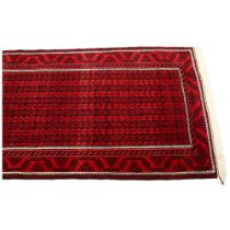 Good quality Bokhara handmade red ground rug, 213cm x 122cm (7' x 4') Good condition