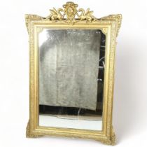 A 19th century gilt-gesso framed wall mirror, with dragon and scroll pediment, overall height approx