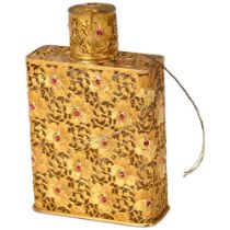 Schiaparelli glass perfume bottle, with jewelled gilt-metal casing, height 6.5cm, original label