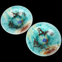 A pair of Clarice Cliff Inspiration Bizarre bowls with hand painted decoration, originally made