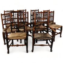 A set of 10 (8 + 2) elm Lancashire spindle-back dining chairs, with rush seats, turned legs and