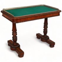 A William IV rosewood writing table, with green baize top and pierced brass gallery, 96 x 57 x 74cm