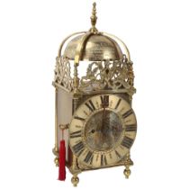 A 19th century brass 8-day lantern clock with silvered chapter ring, brass double fusee chain-driven