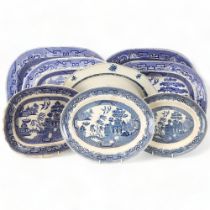 A group of 19th century English blue and white transfer chinoiserie meat plates, largest 50cm x 40cm