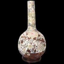 A large Japanese porcelain onion-shaped vase, circa 1900, with enamel blossom design, blossom design