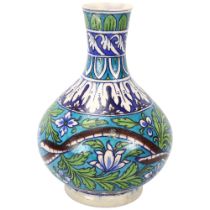 A Persian Multan pottery narrow-neck vase with serpent design, height 25cm Restored rim chip