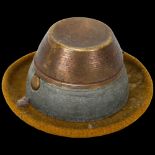 A novelty German hat design travelling inkwell, brass and cloth edged, diameter 8cm