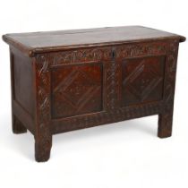 A late 17th century oak blanket chest with plank top, lozenge carved 2 panel front, 100 x 49cm,