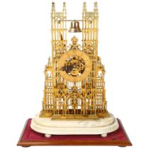 A fine and impressive English brass Westminster Abbey skeleton clock, in the manner of Evans Of