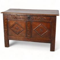 An 17th century oak panelled coffer of small size, circa 1680, with lozenge carved 2 panel front, 91