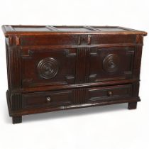 An 17th century oak mule chest, with panel top, 2-panel carved front and single drawer under, 133