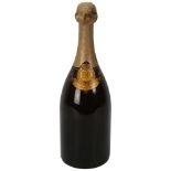 A bottle of Moet & Chandon, Elizabeth II Coronation Cuvee A.D. 1953 Champagne, vintage 1943