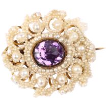 A Georgian seed pearl and mother-of-pearl foil-back amethyst brooch, circa 1830, the central 2ct