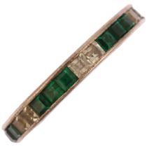 An Art Deco green and white paste full eternity ring, unmarked white metal settings with square-