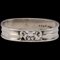 GEORG JENSEN and WENDEL - an Art Deco Danish sterling silver oval napkin ring, with pierced