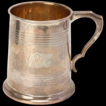 A George V silver half pint christening mug, William Hutton & Sons Ltd, Birmingham 1928, tapered